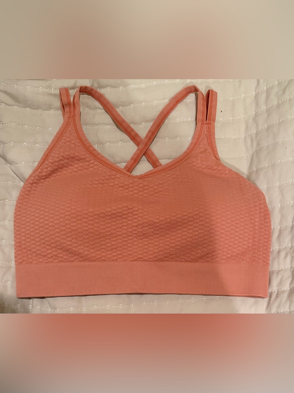 Zella’s Coral Peach Seamless Cross-Back Sports Bralette